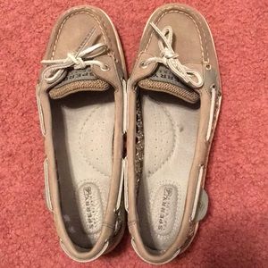 Grey and silver sperrys